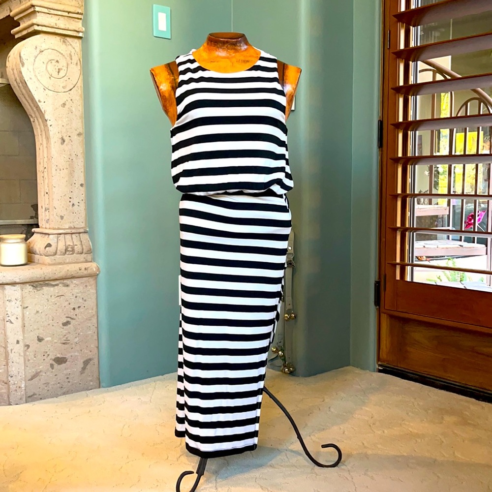 Black/white striped midi dress slit on one side with rouching. Bloused waistline